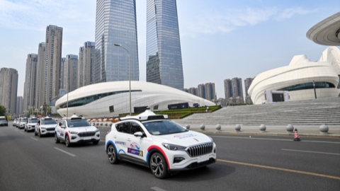 Self-driving taxis open to public in China's Changsha